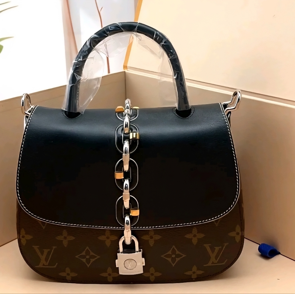 Louis Vuitton Monogram Canvas Chain It PM Bag.